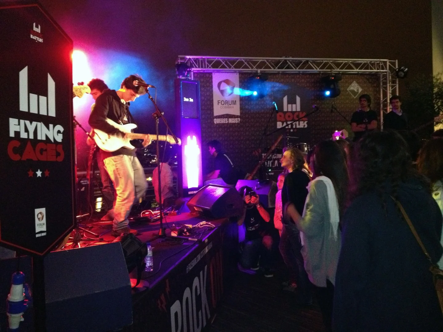 Flying Cages playing live to the crowd.